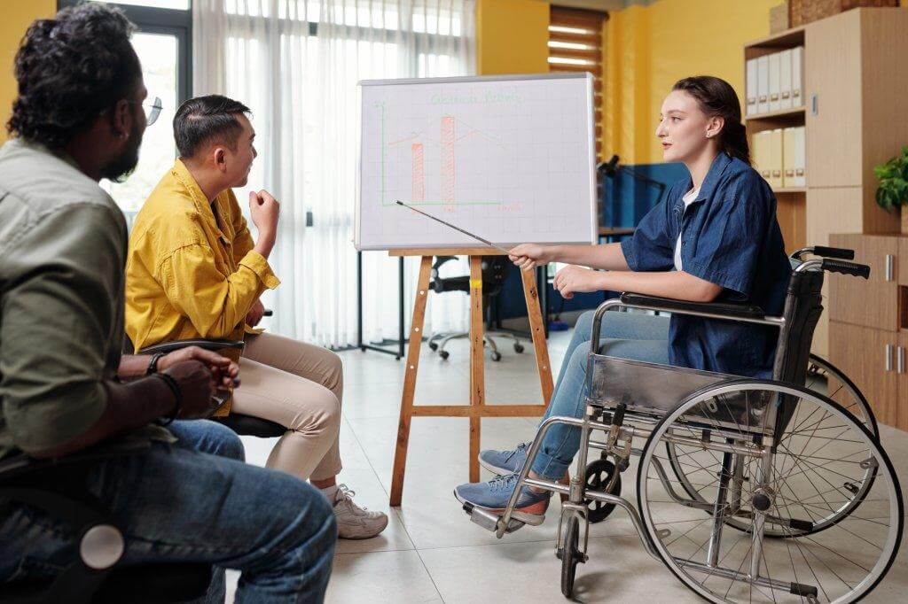 Ekaa Care team member discussing personalised NDIS goals and development life skills planning with a client